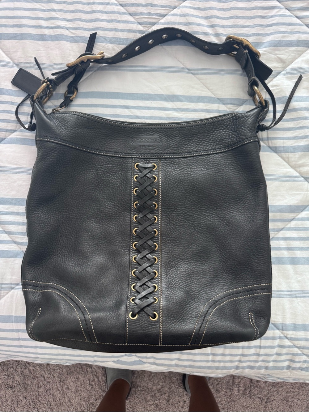 Coach Black Leather Shoulder Bag with Lace-Up Center and Gold Hardware
